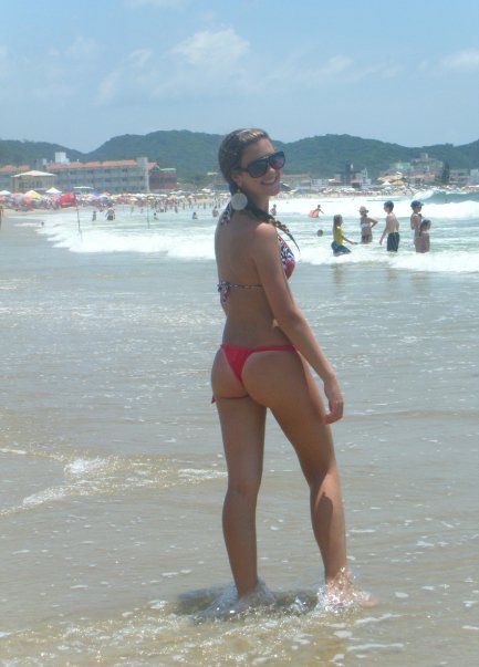 1girl ass beach bikini female photo real_person sunglasses water