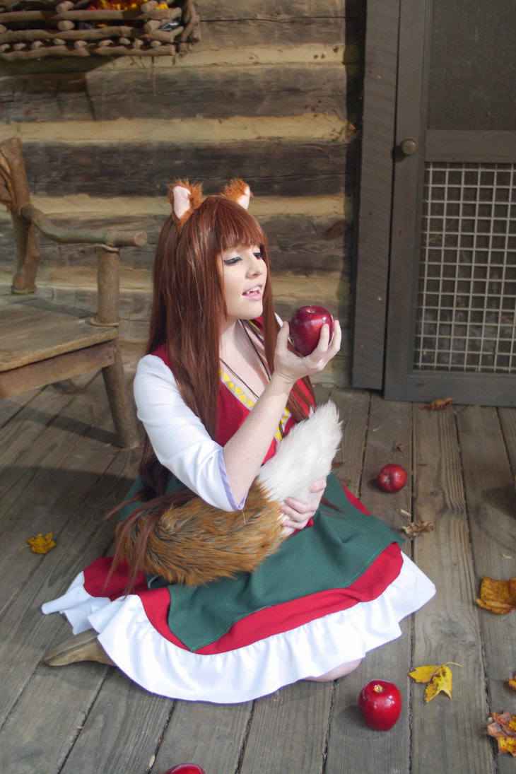 1girl breasts brown_hair cosplay female fox_ears foxycosplay holo long_hair outside solo spice_and_wolf tagme