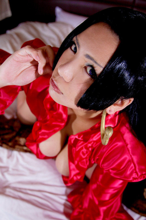 asian bed black_hair breasts chouzuki_maryou cleavage cosplay earrings female huge_breasts long_hair solo