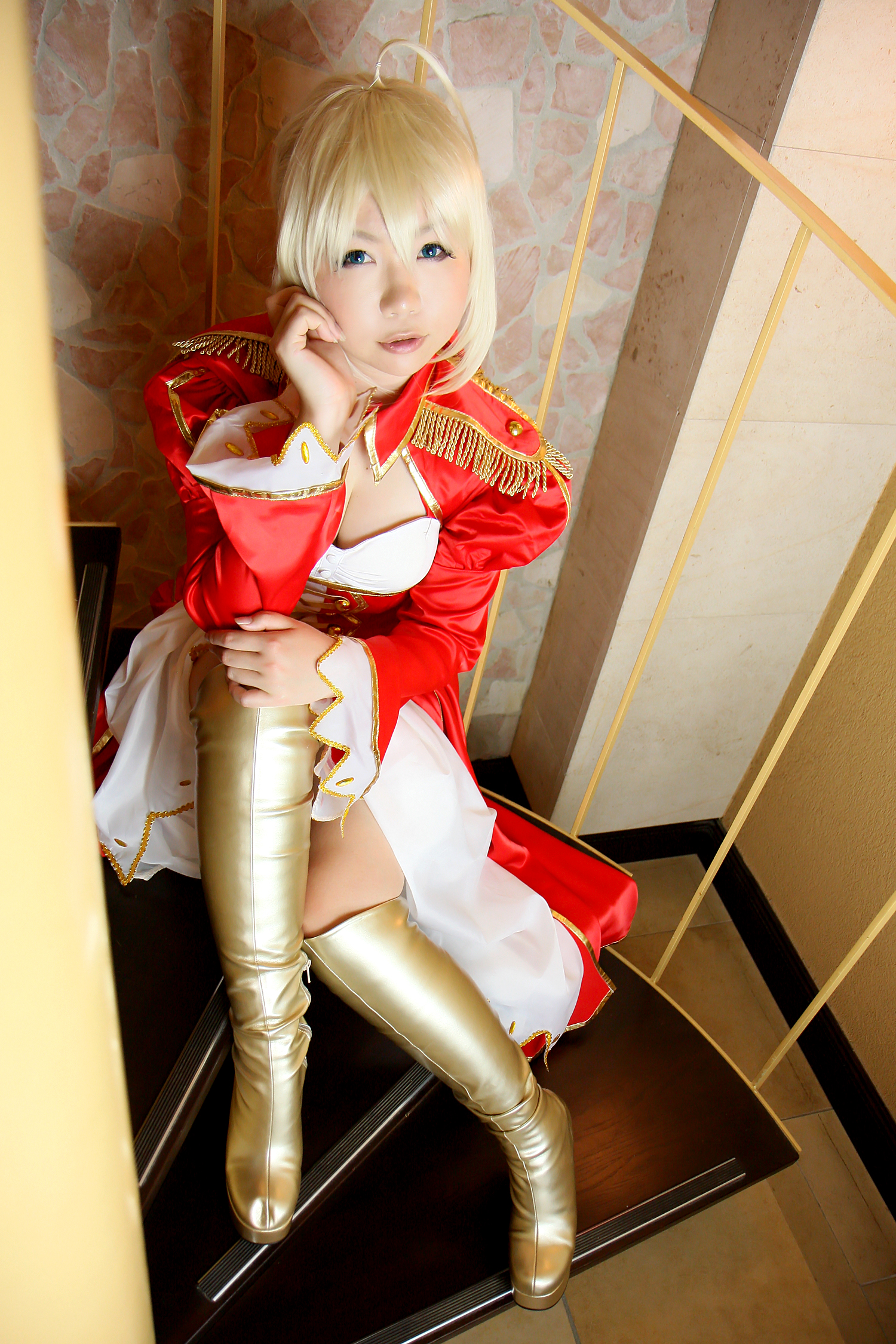 asian blonde_hair boots breasts cleavage cosplay dress female high_heels long_hair sitting solo stairs