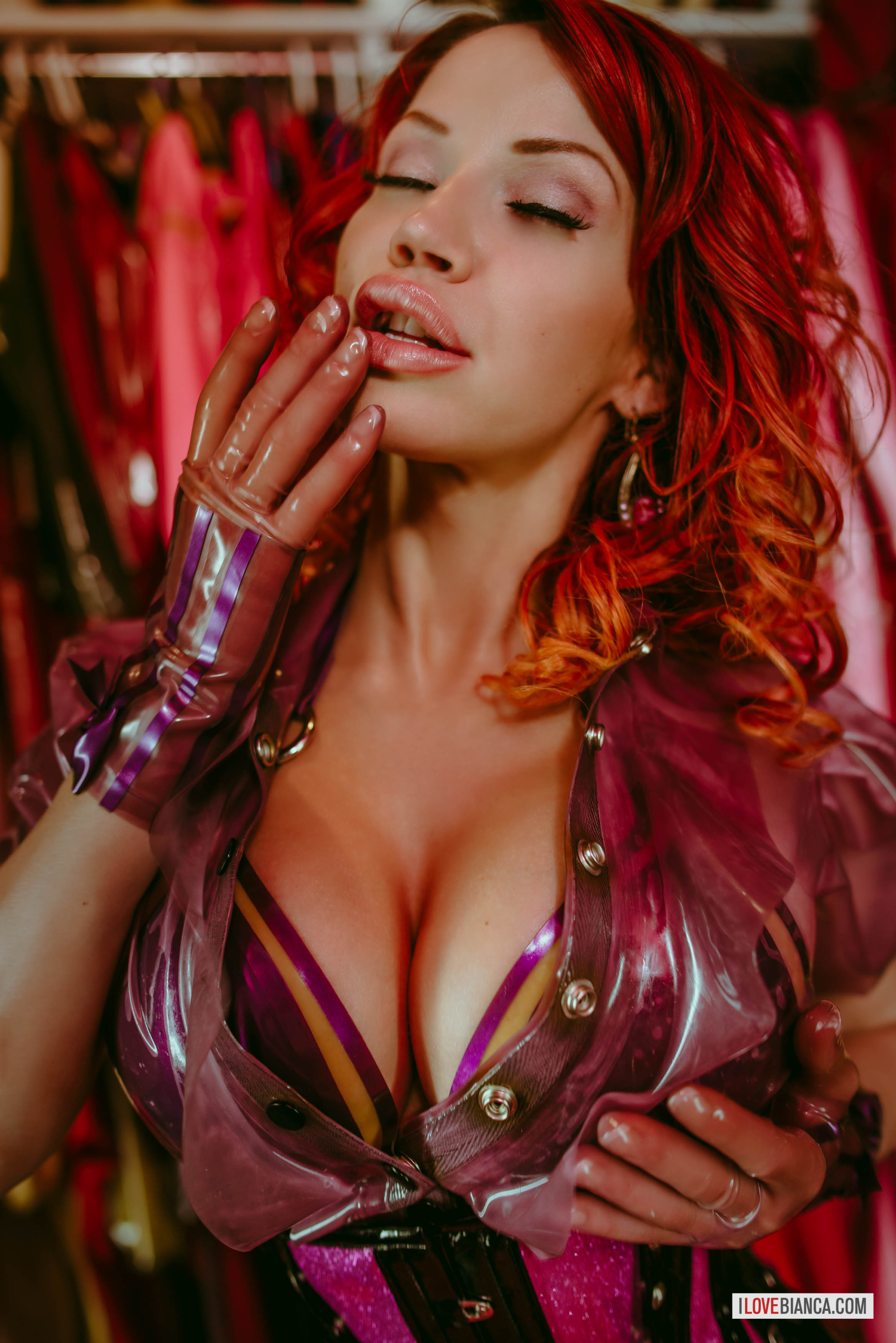 bianca_beauchamp boots bra breasts cleavage corset female high_heels large_breasts latex long_hair red_hair solo watermark