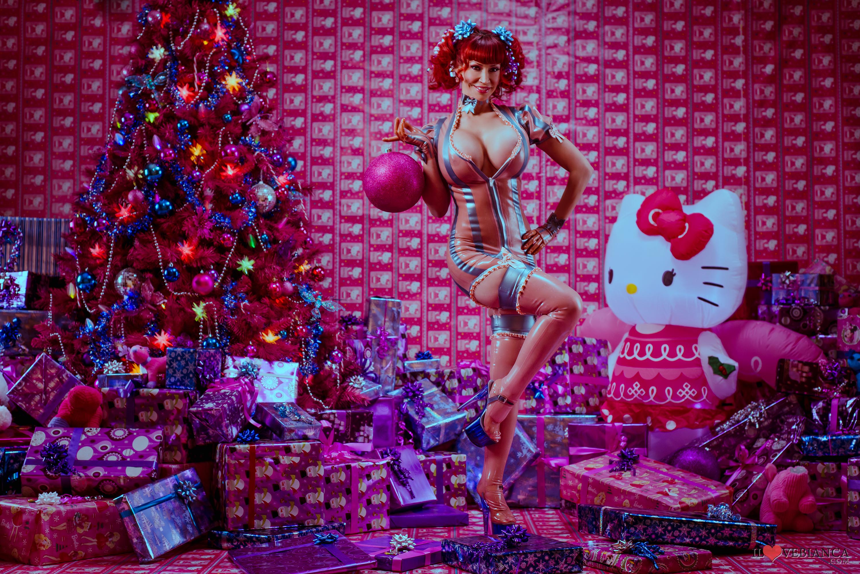 bianca_beauchamp breasts christmas christmas_tree cleavage dress female large_breasts latex long_hair pigtails red_hair solo thighhighs watermark