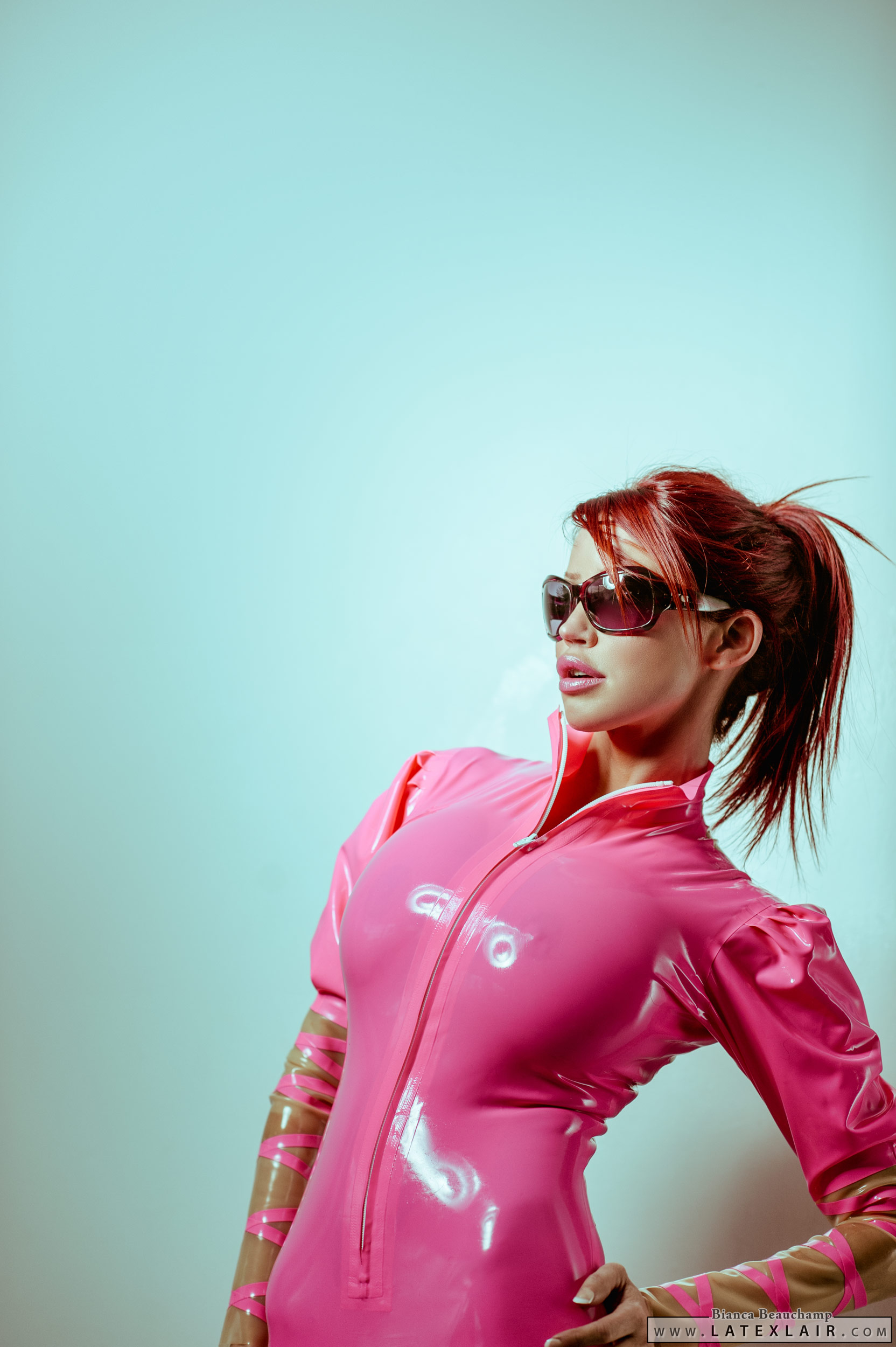 bianca_beauchamp breasts female large_breasts latex long_hair red_hair solo