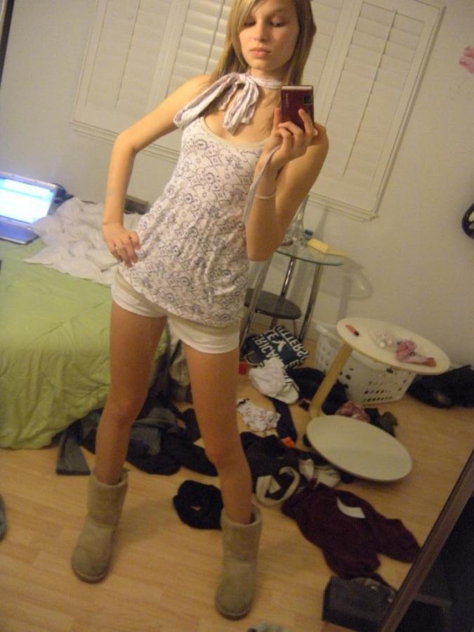 bedroom blonde_hair boots camisole hand_on_hip hip_cocked self_shot shorts slender small_breasts