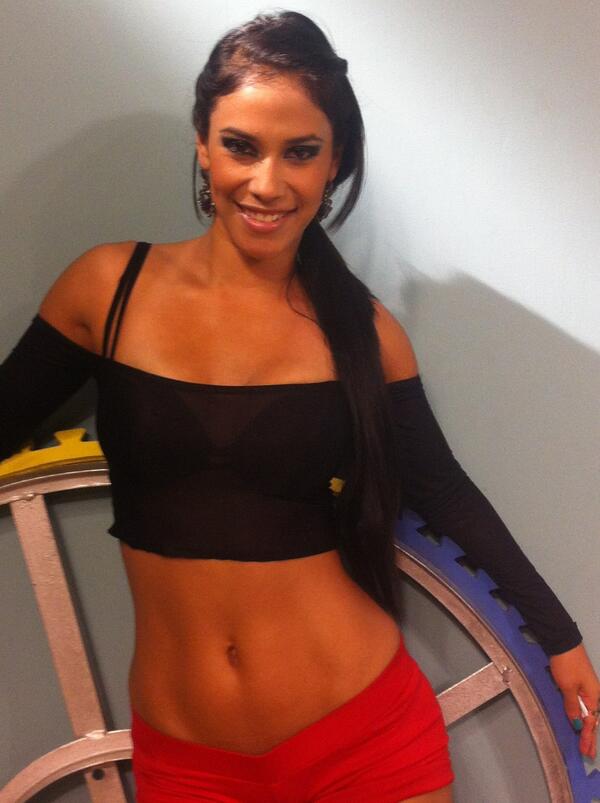abs black_hair earring makeup outfit photo pose red_shorts smile