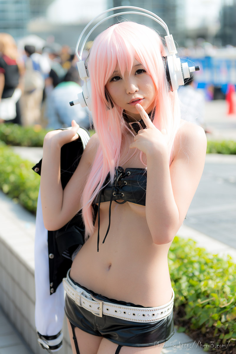asian breasts collar cosplay headphones long_hair midriff navel outside pink_hair short_shorts