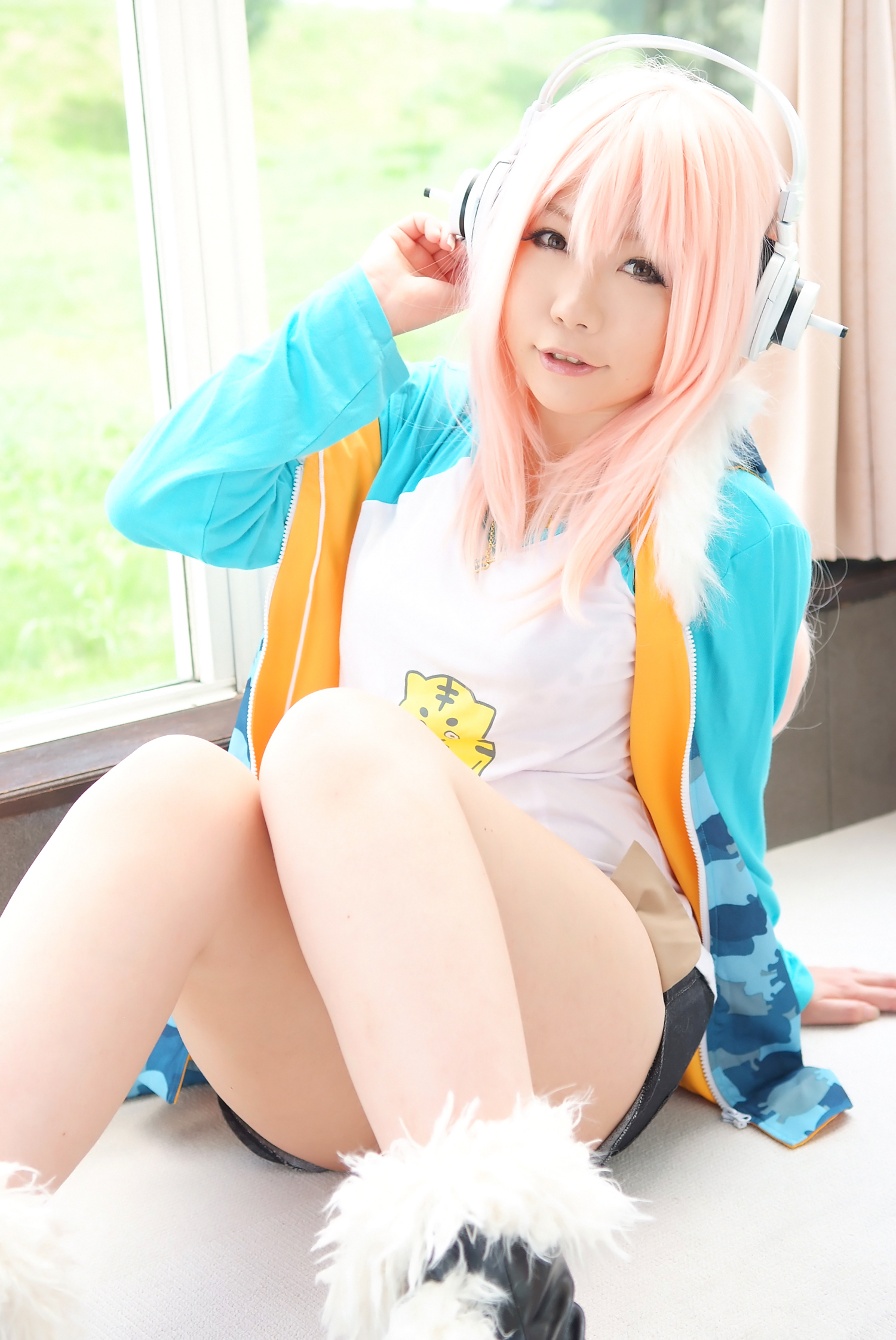 asian breasts cosplay female headphones large_breasts long_hair pink_hair solo