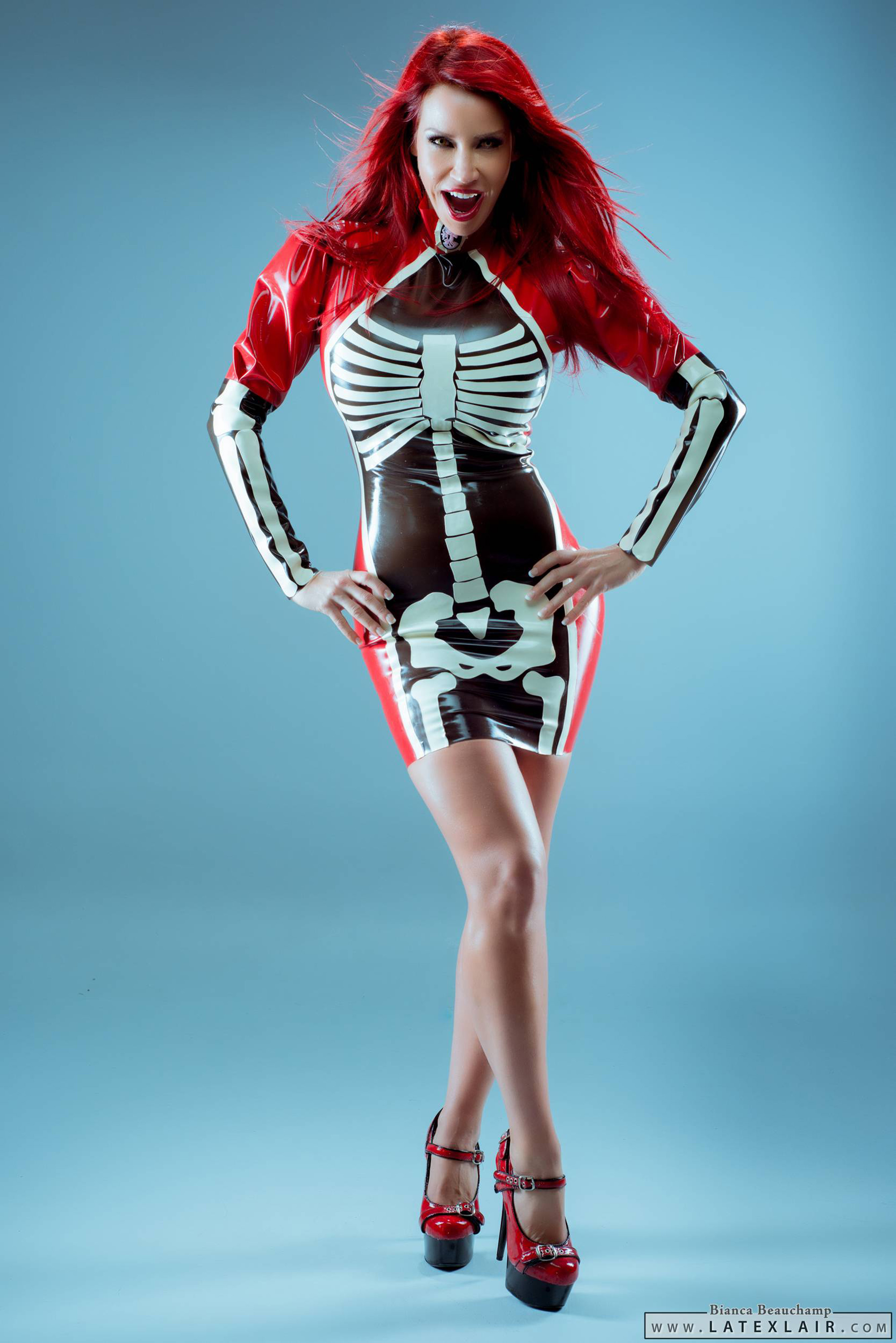 bianca_beauchamp breasts female large_breasts latex long_hair red_hair solo