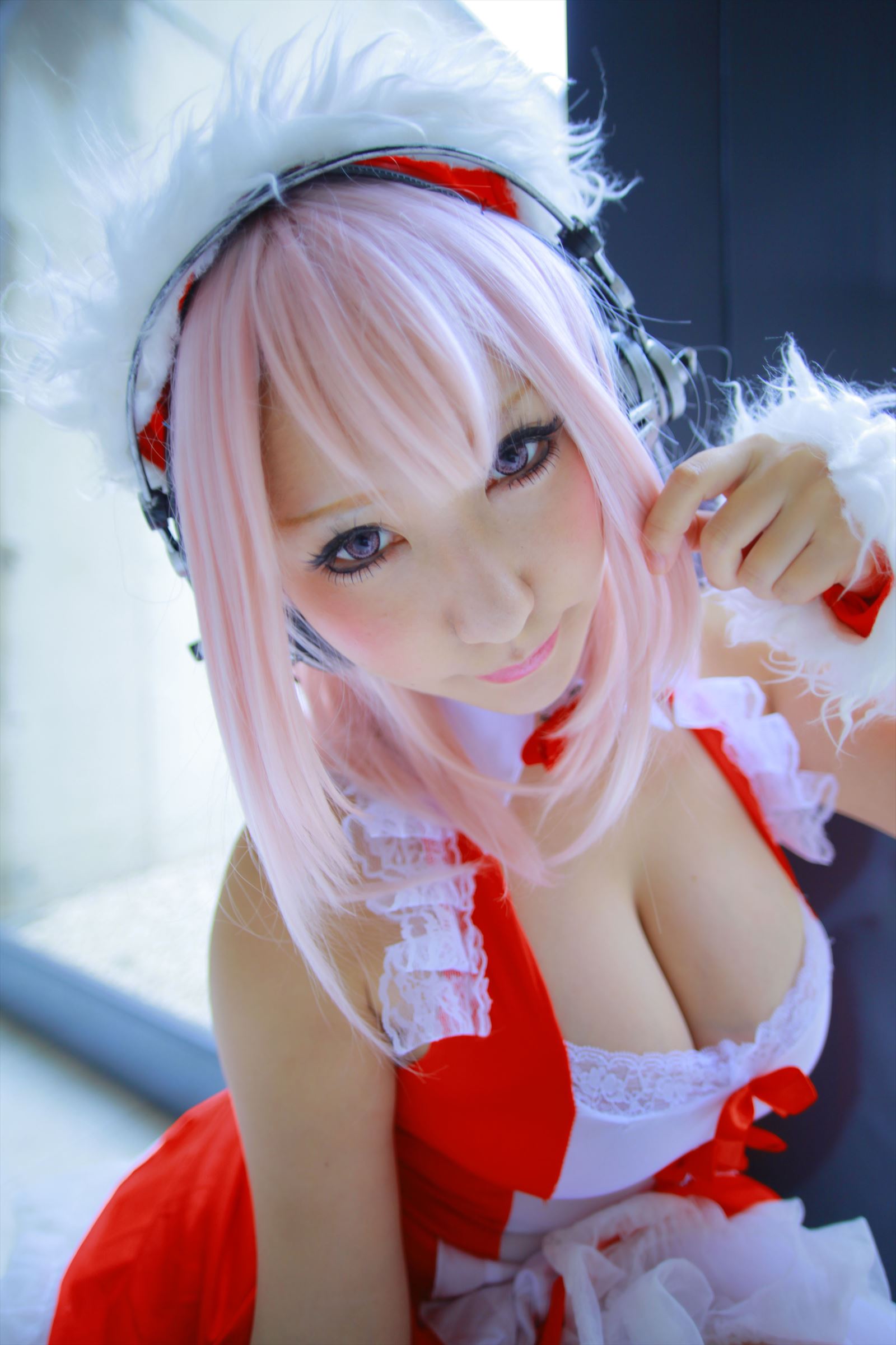 asian breasts cleavage cosplay female headphones large_breasts long_hair pink_hair shooting_star solo