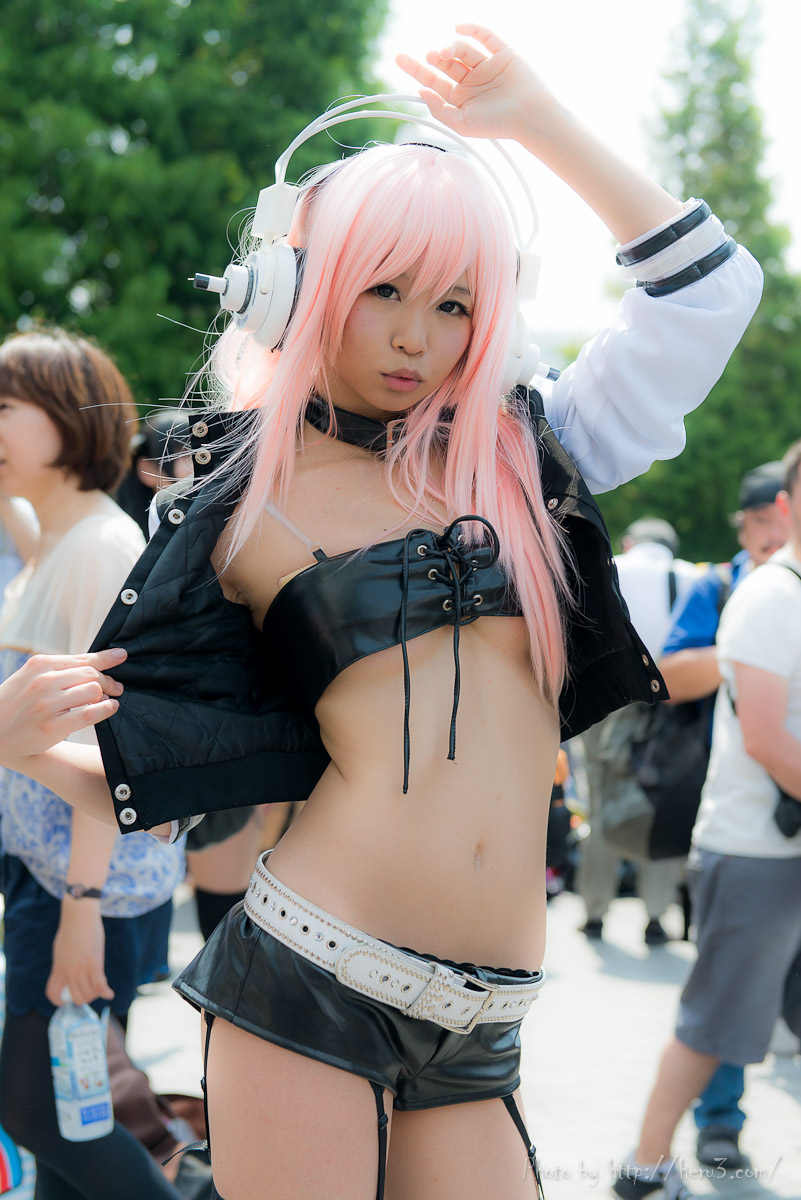 asian breasts cosplay female headphones long_hair midriff navel outside pink_hair solo watermark