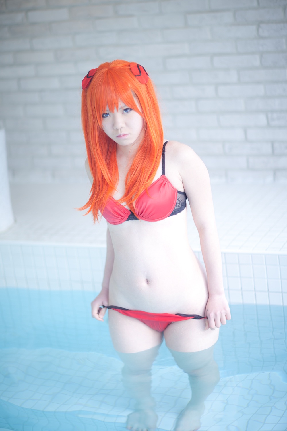 asian asuka_langley_sohryu breasts cosplay female long_hair neon_genesis_evangelion orange_hair solo