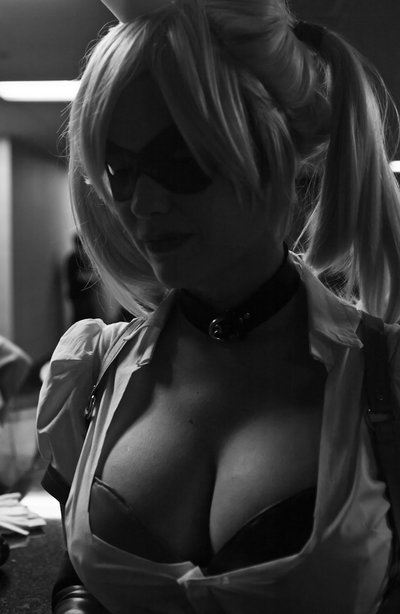batman_(series) big_breasts black_and_white breasts cleavage cosplay dc female female_only harley_quinn huge_breasts mask solo