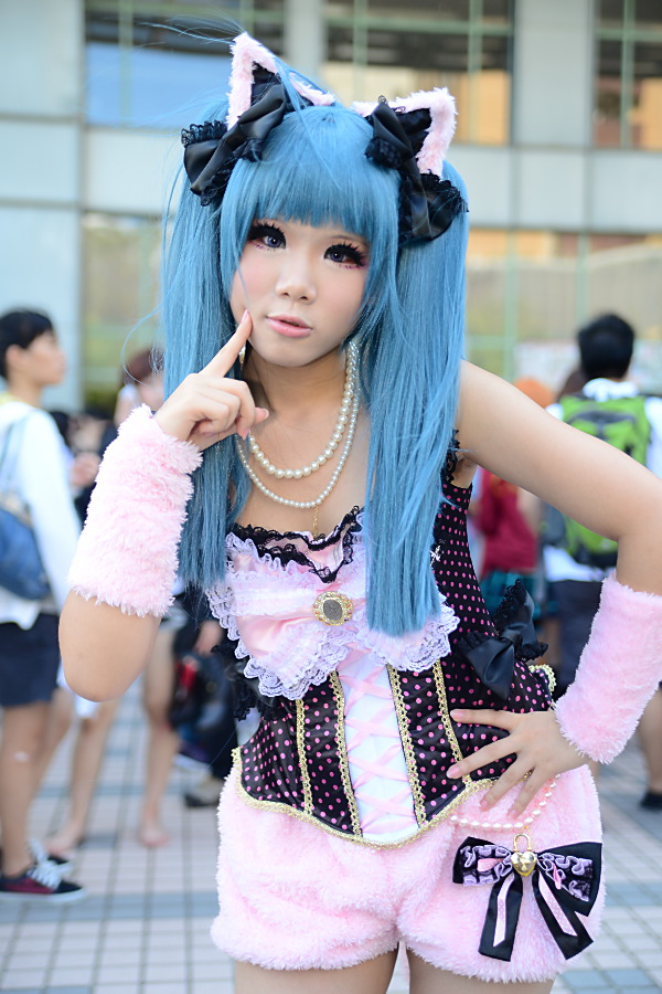 aqua_hair asian breasts clothed clothed_female cosplay female long_hair public solo solo_female