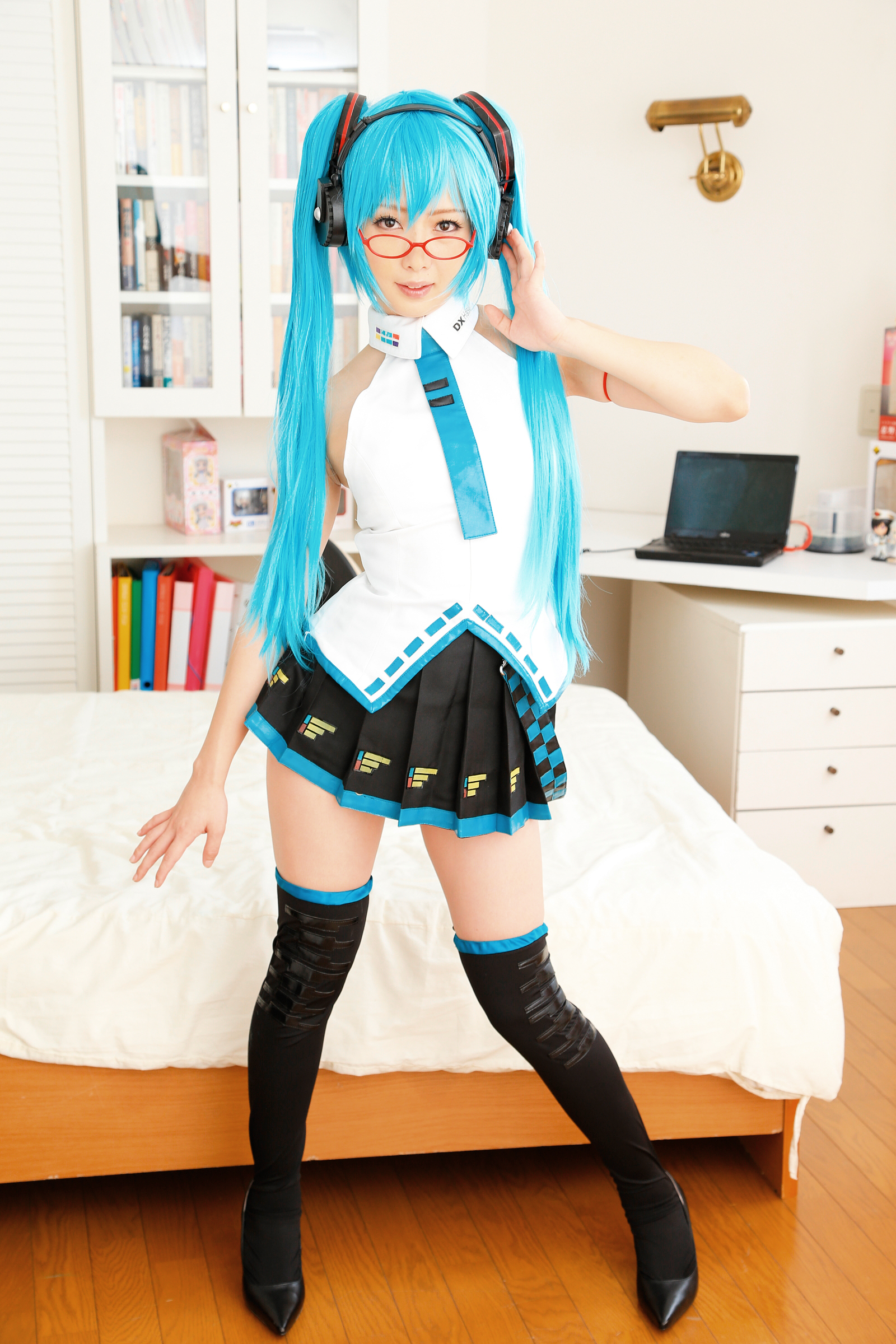 asian blue_hair cosplay female glasses headphones high_heels long_hair necktie shoes skirt socks solo