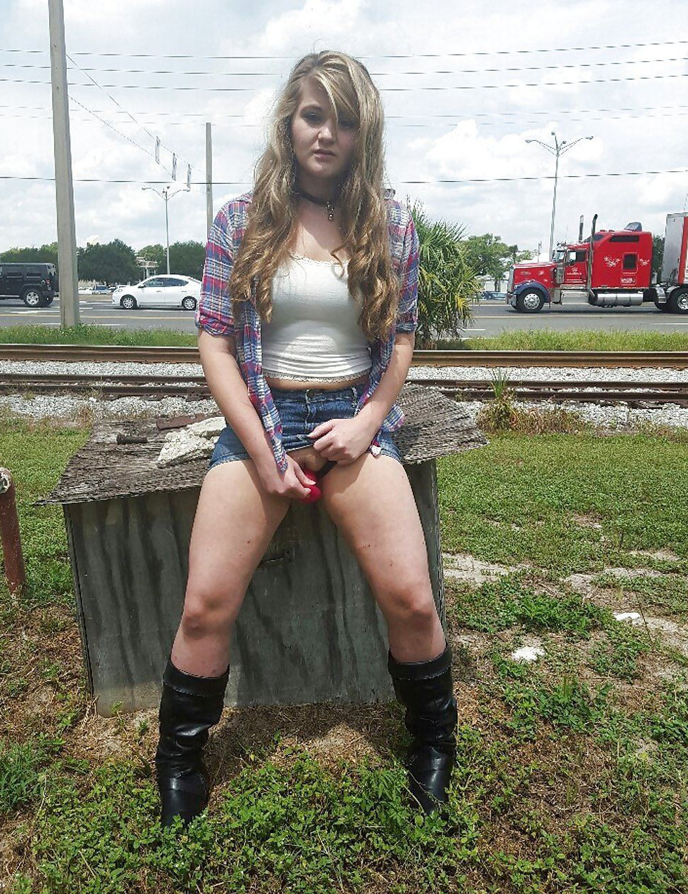 blonde_hair boots choker curly_hair dildo masturbation partially_clothed public skirt whitney_wisconsin