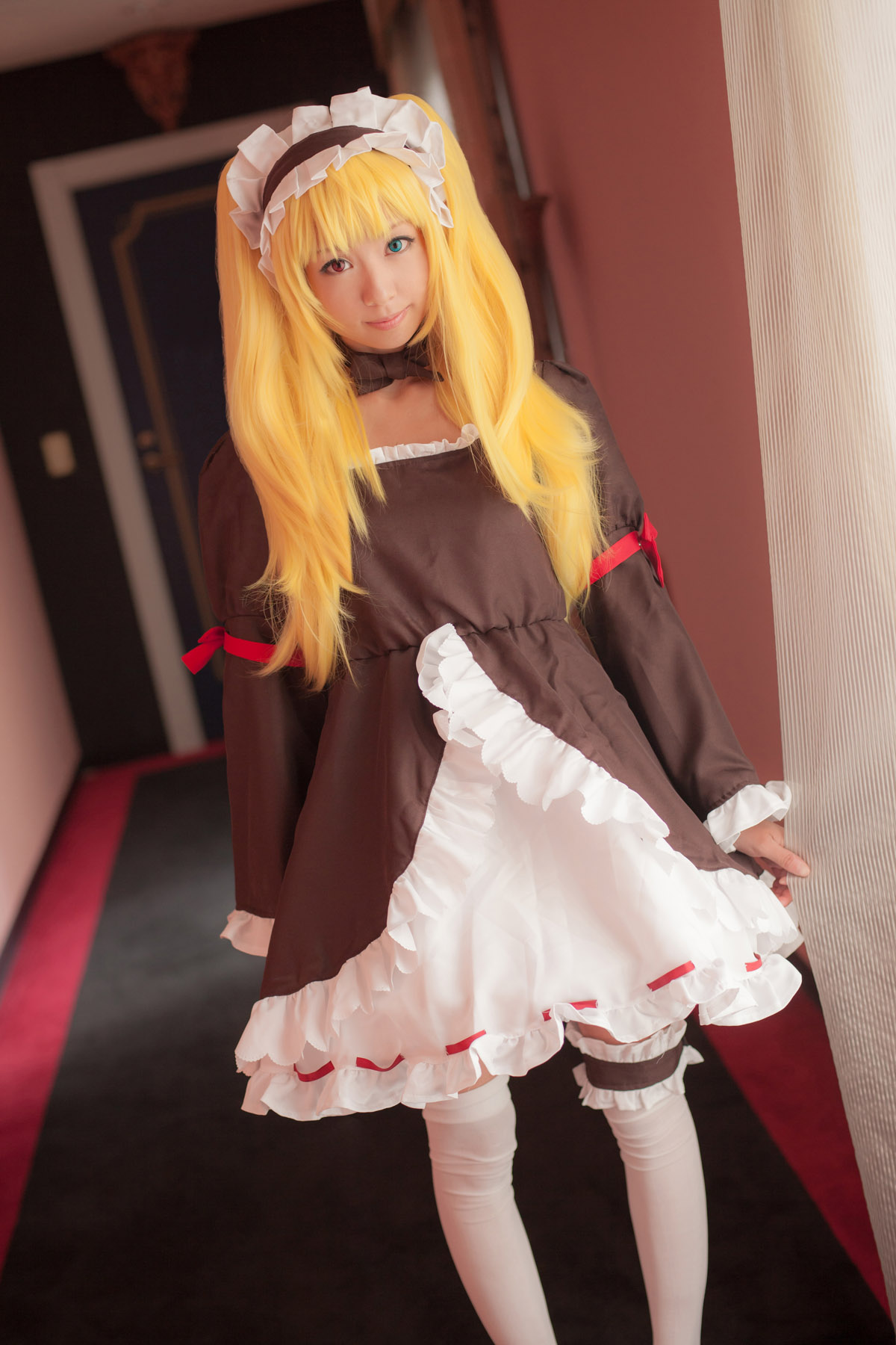 asian blonde_hair breasts cosplay dress female high_heels large_breasts long_hair shoes solo thighhighs twintails