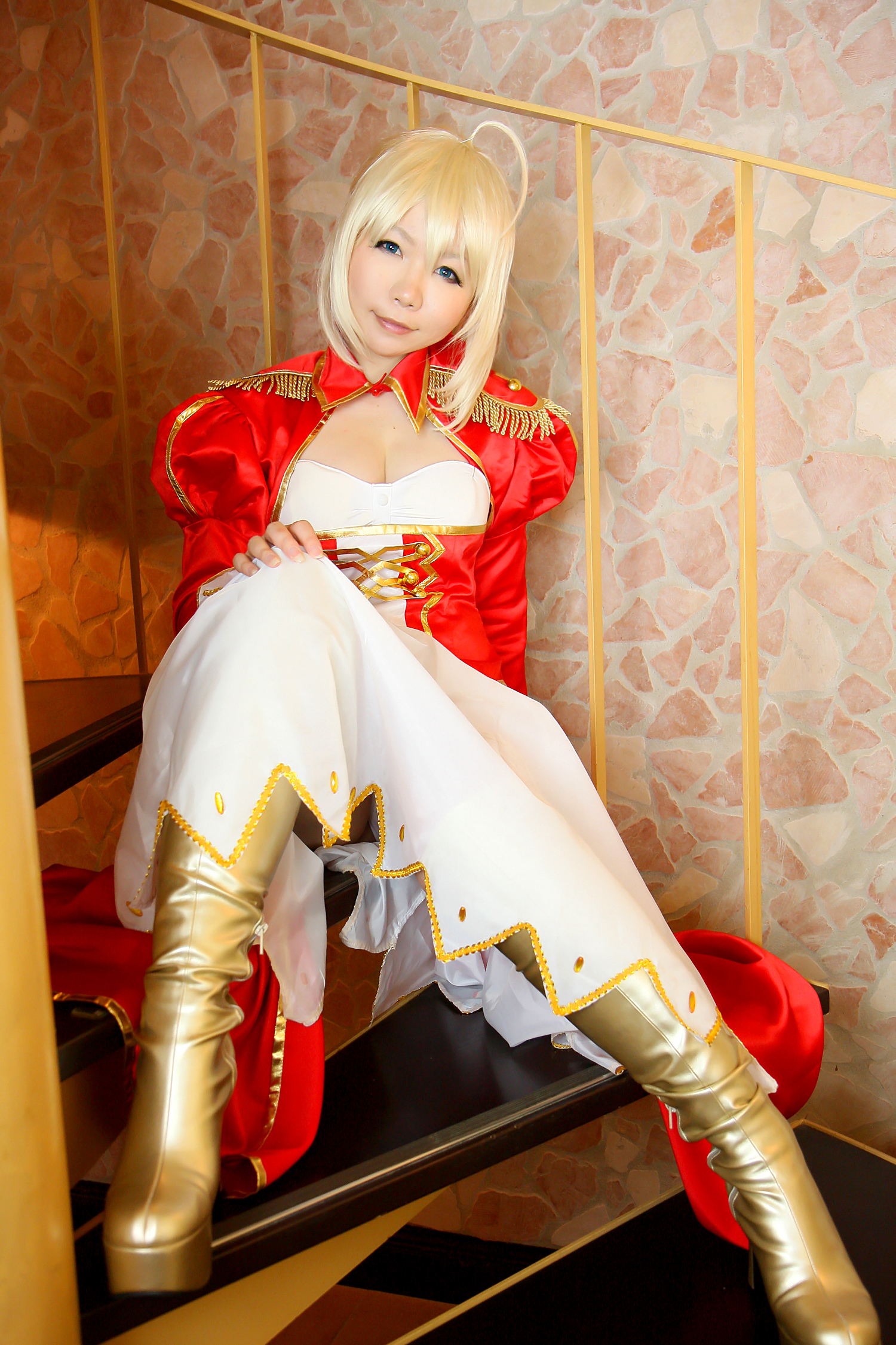 asian blonde_hair boots breasts cleavage cosplay dress female high_heels long_hair sitting solo stairs
