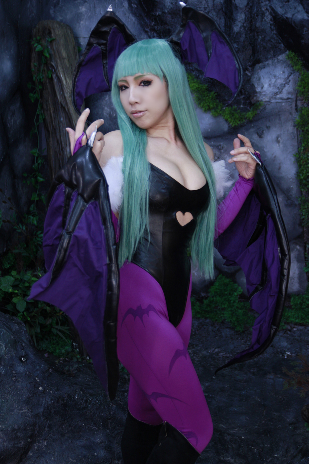 1girl asian bare_shoulders breasts capcom cleavage clothed cosplay darkstalkers female female_only green_hair large_breasts leotard long_hair morrigan_aensland non-nude nonsummerjack solo succubus wings