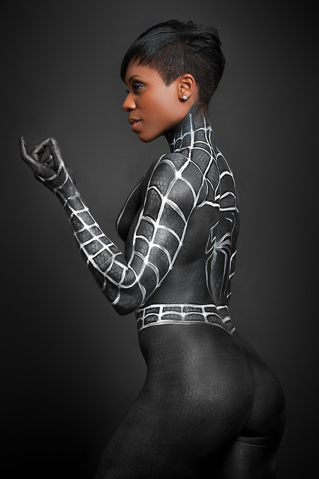 ass black black_woman bodypaint breasts cosplay dark-skinned_female dark_skin nude painting photo real_person short_hair sideboob spider_woman