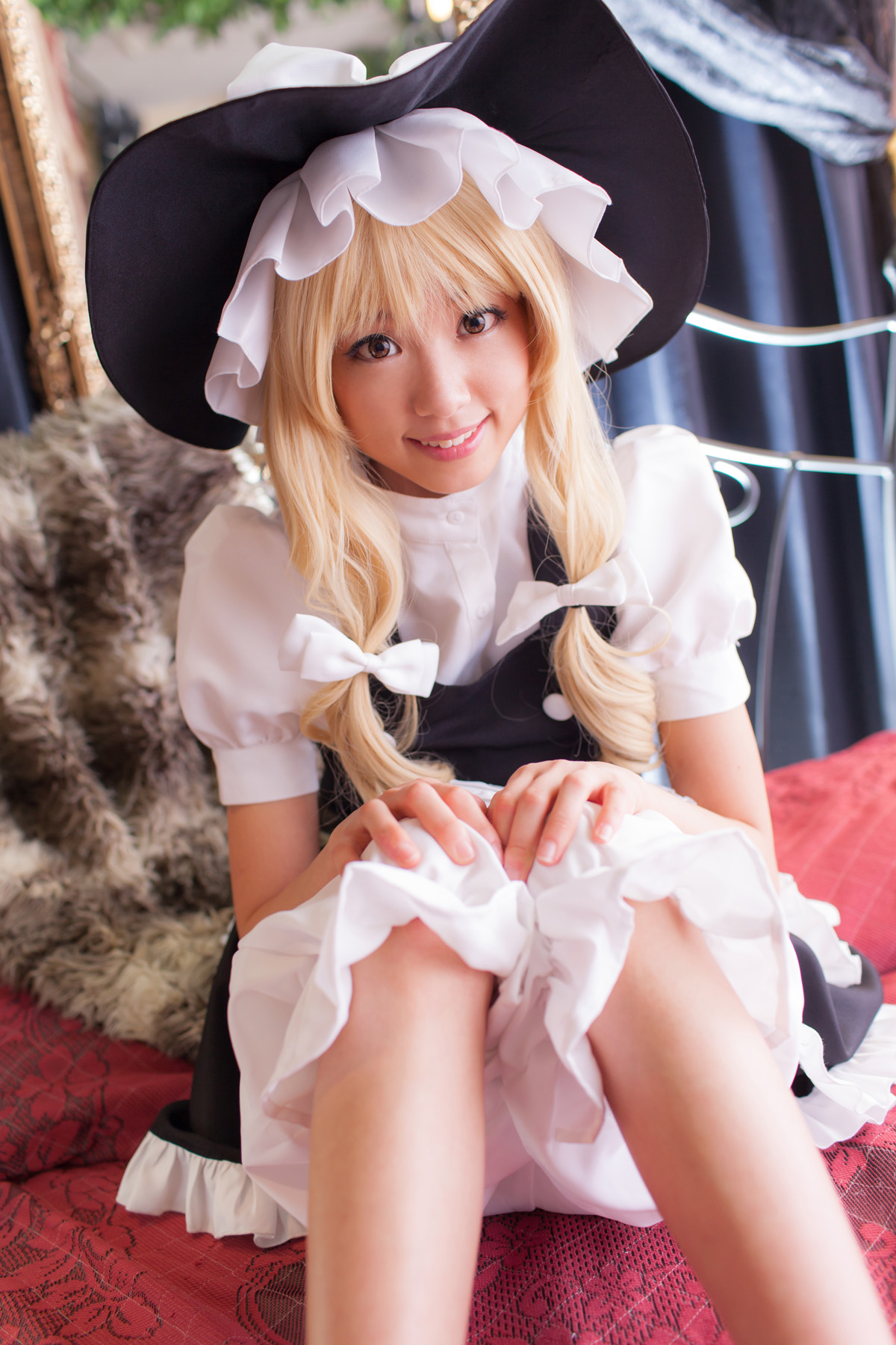 asian bed blonde_hair breasts cosplay dress female hat long_hair shoes sitting socks solo