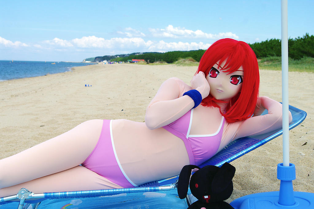 beach bikini breasts female kigurumi long_hair lying midriff red_hair solo water