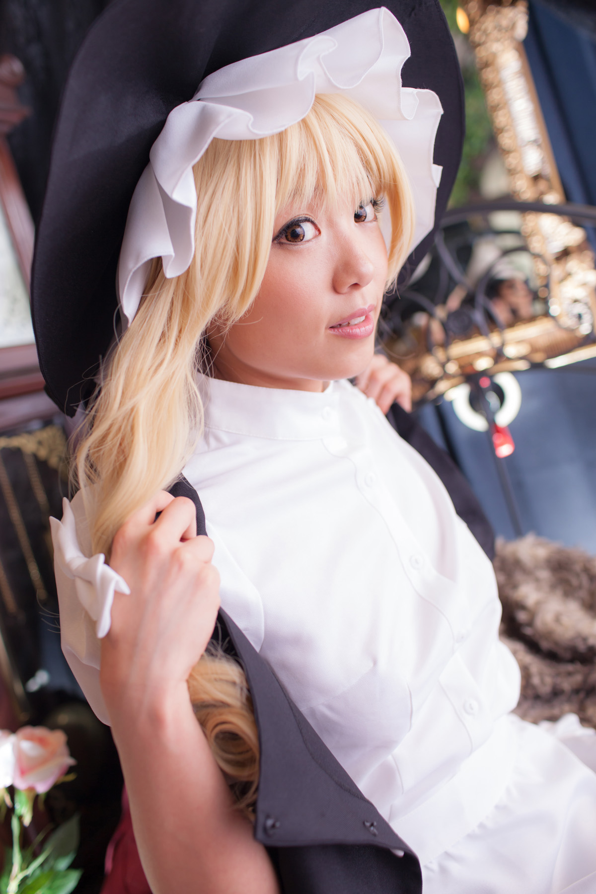 asian bed blonde_hair breasts cosplay dress female hat long_hair shoes socks solo