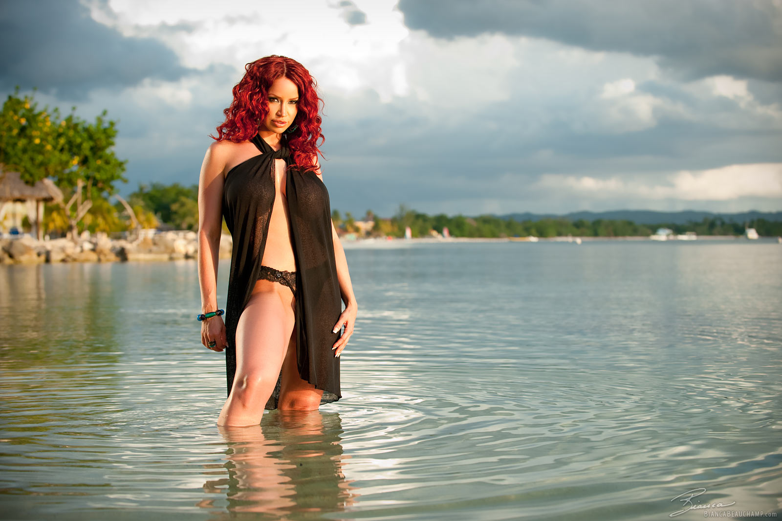 bianca_beauchamp breasts female large_breasts long_hair outside red_hair solo water watermark