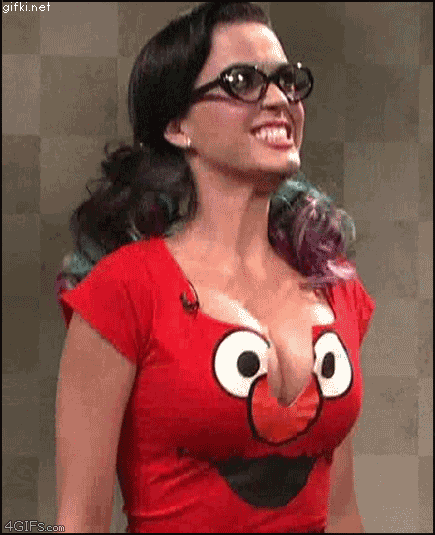 animated breasts cleavage female gif glasses katy_perry solo text watermark