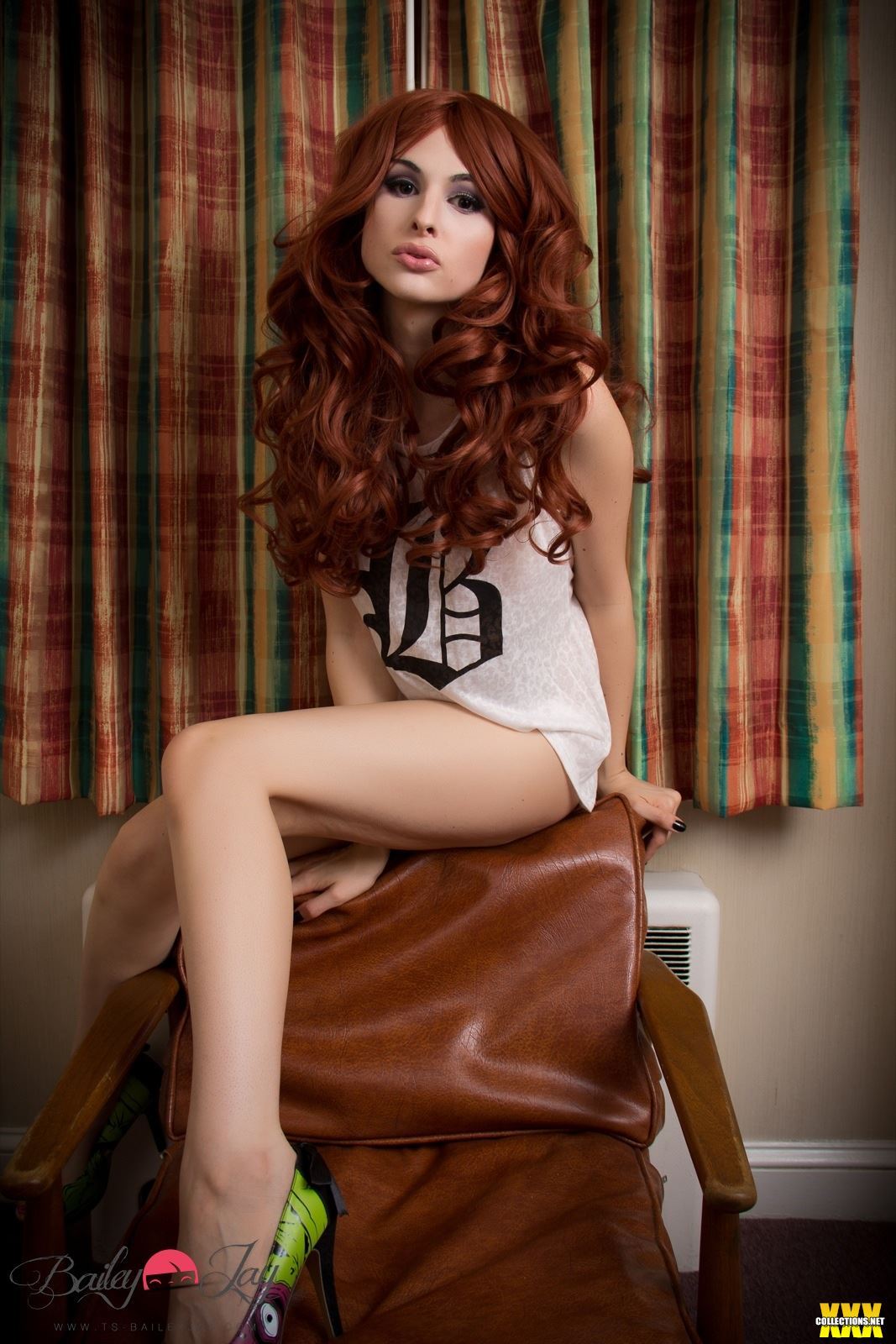 bailey_jay breasts brown_hair chair high_heels large_breasts long_hair shemale shoes solo watermark
