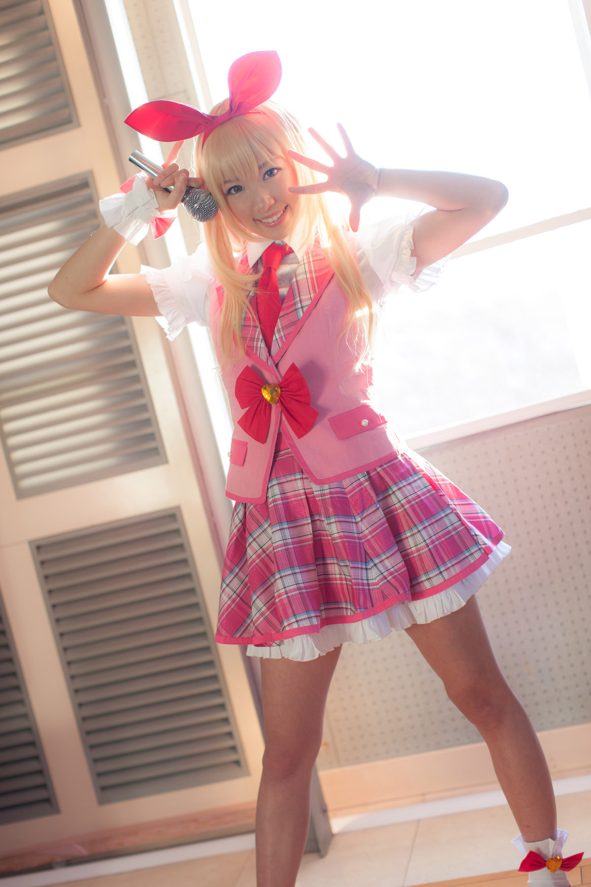 asian blonde_hair breasts cosplay female microphone shoes short_hair skirt solo