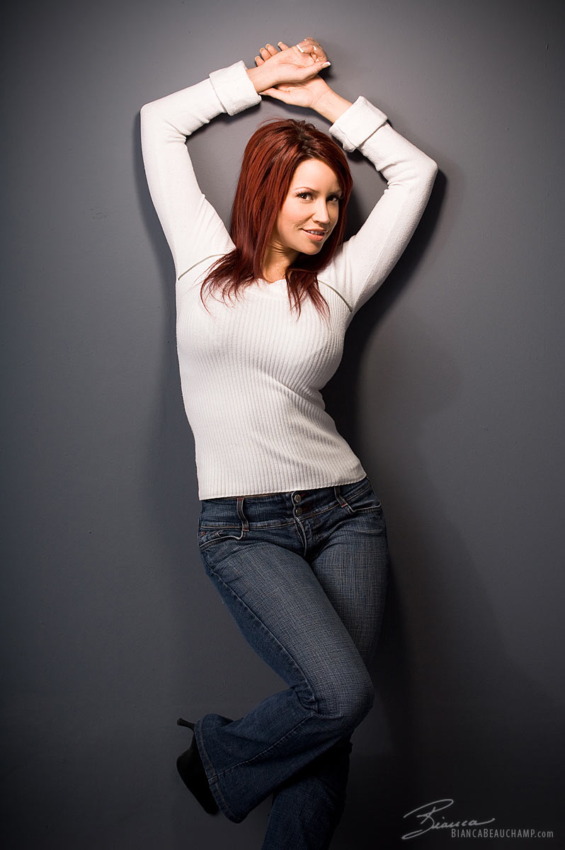 bianca_beauchamp breasts female large_breasts long_hair red_hair simple_background solo watermark