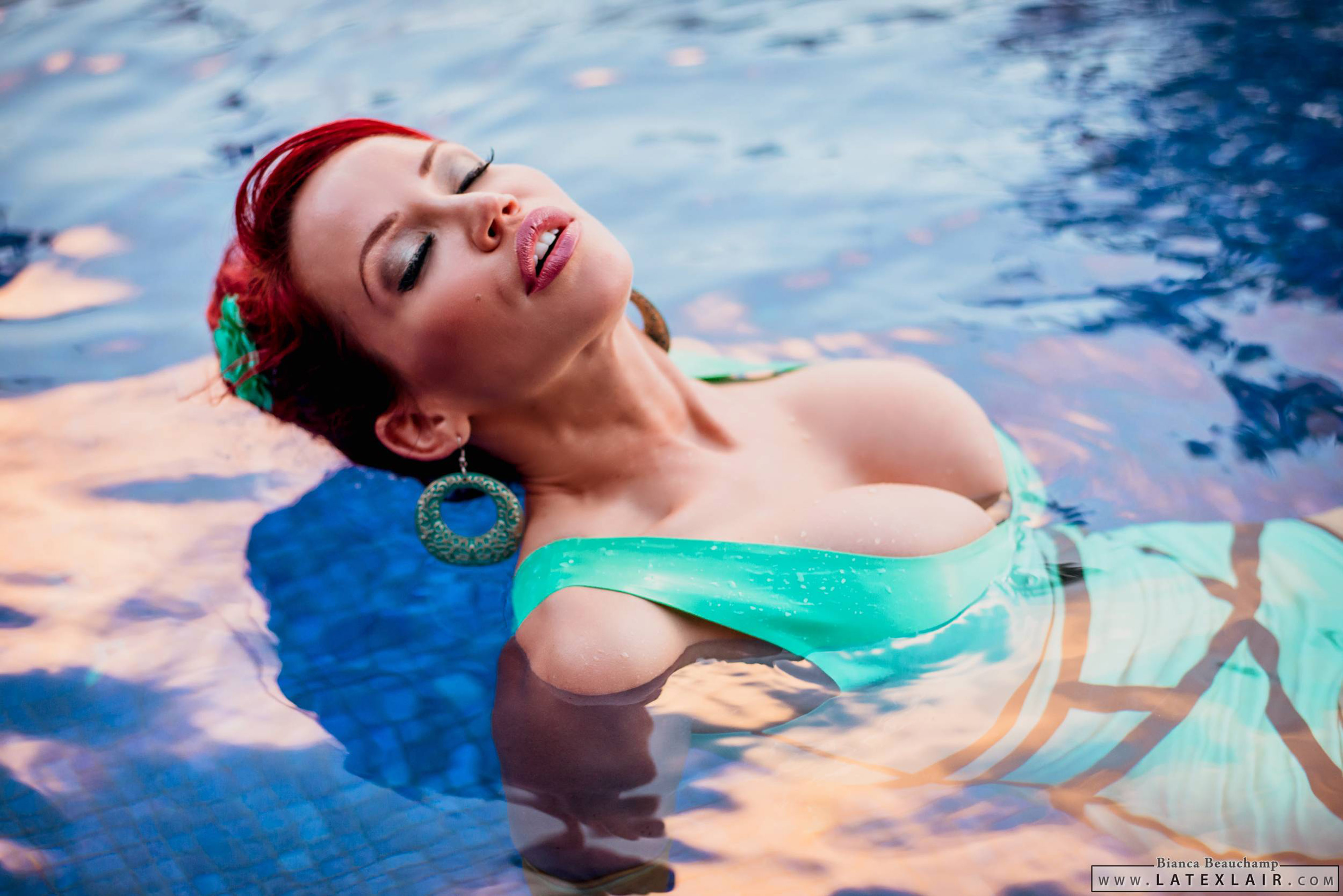 bianca_beauchamp breasts female large_breasts long_hair red_hair solo water watermark wet