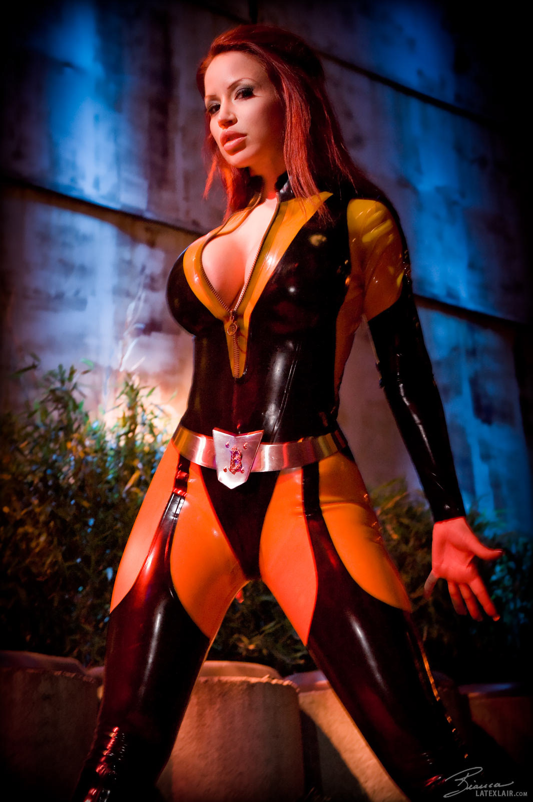 bianca_beauchamp breasts female large_breasts latex long_hair red_hair solo watermark
