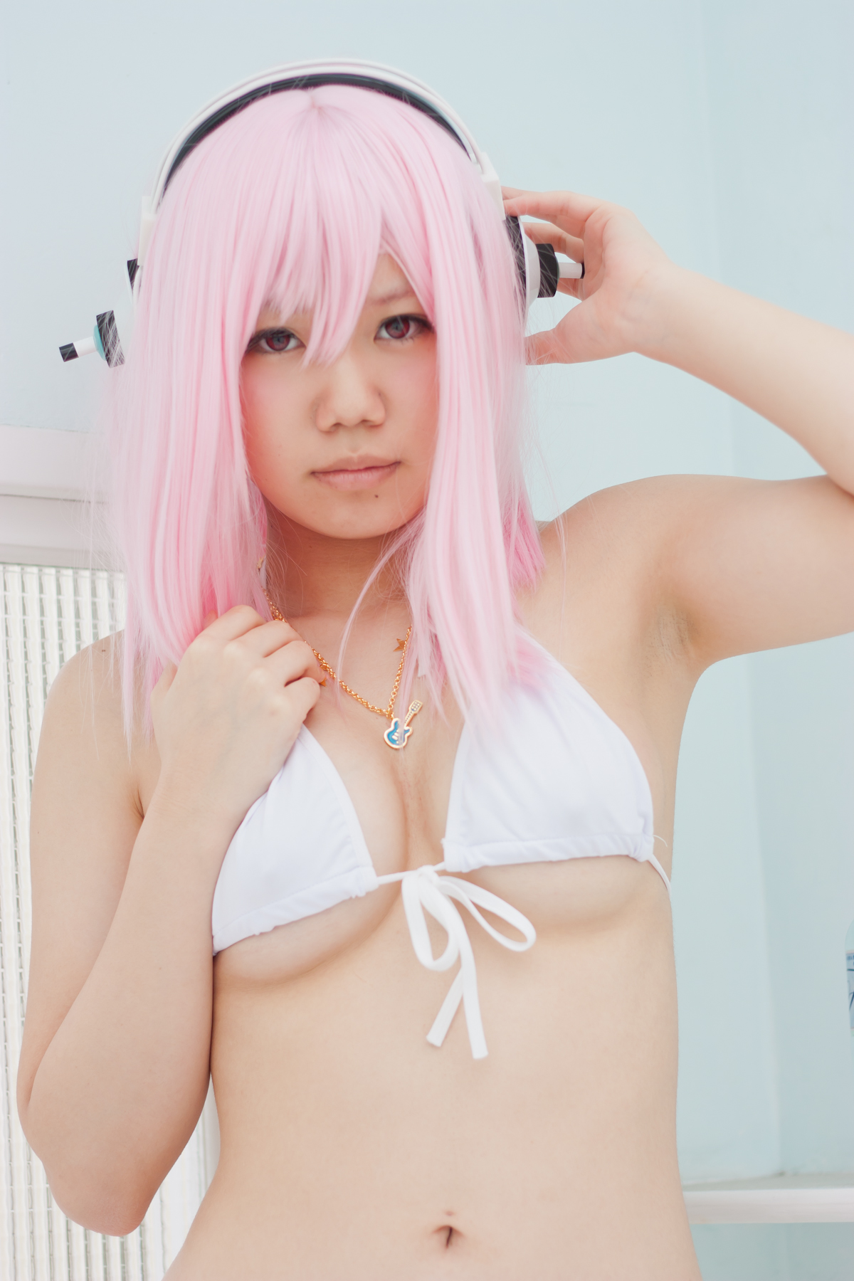 asian bikini breasts cosplay female headphones long_hair pink_hair solo