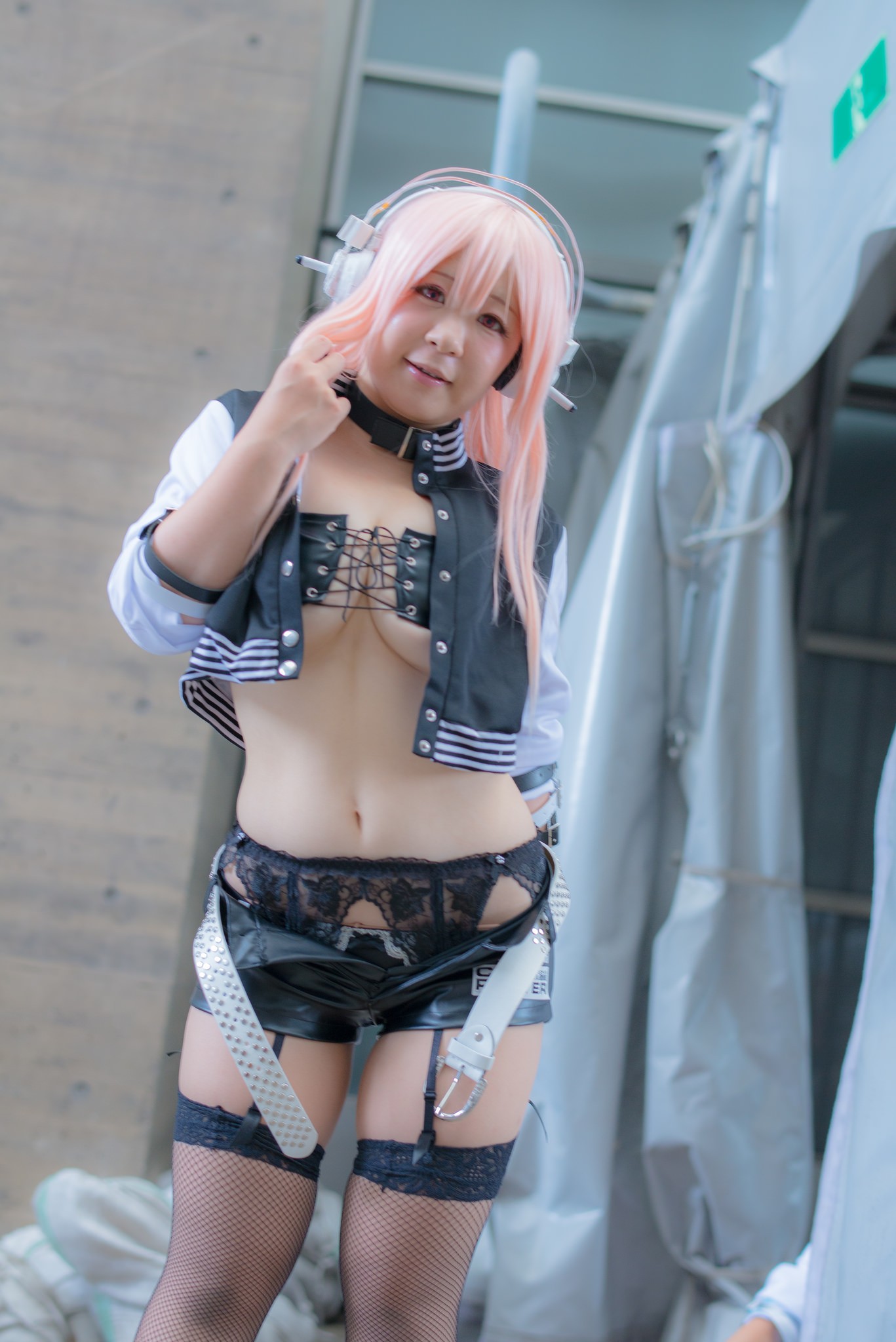 asian breasts cleavage collar cosplay female fishnets headphones large_breasts long_hair midriff navel pink_hair solo thighhighs