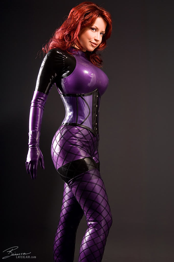bianca_beauchamp breasts catsuit female gloves large_breasts latex long_hair red_hair simple_background solo watermark