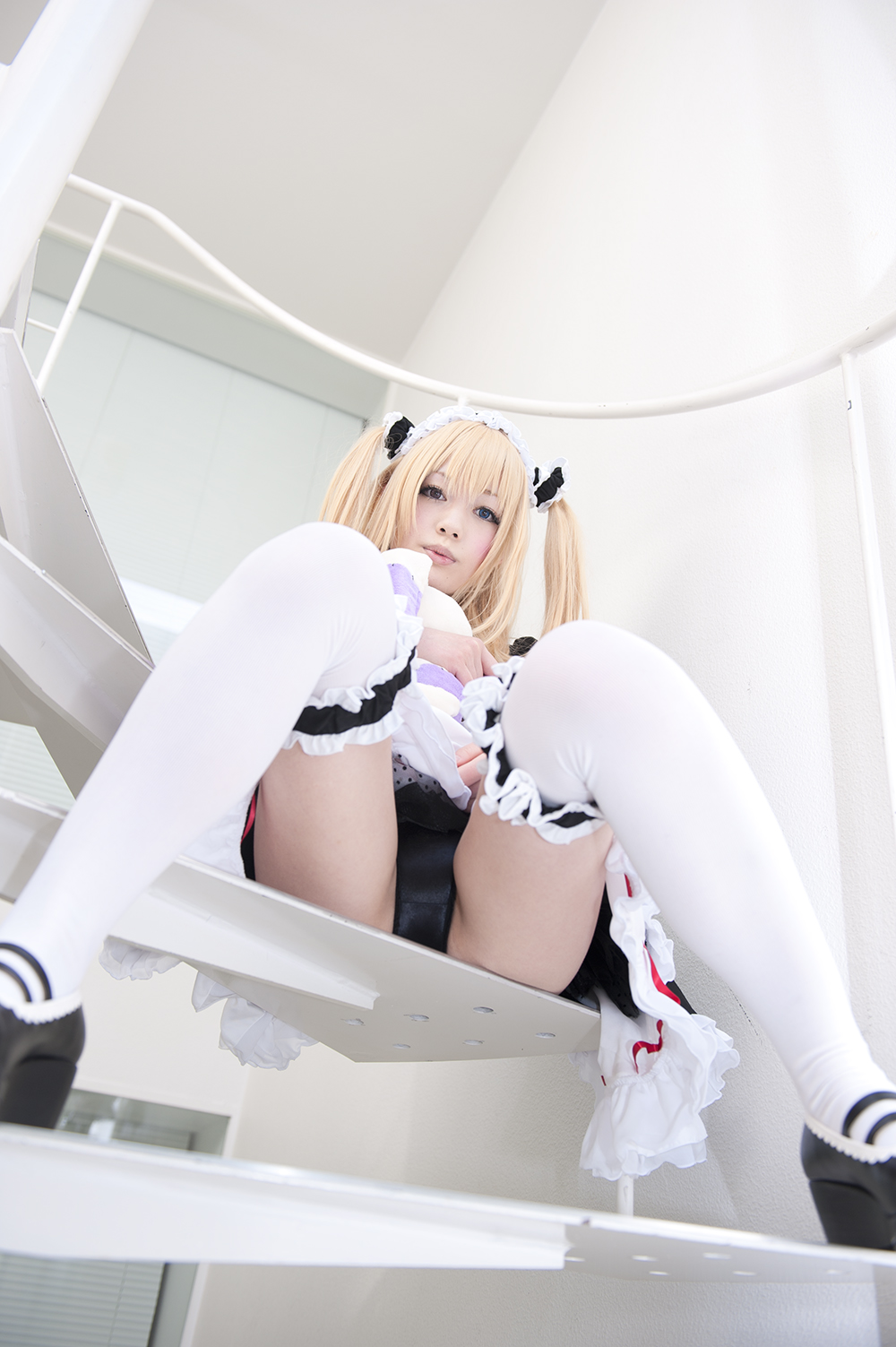 asian blonde_hair breasts female long_hair pigtails sitting solo stairs