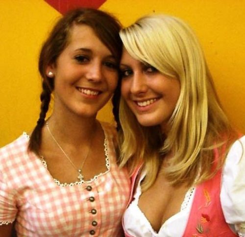 2girls bavaria blonde_hair breasts cleavage dirndl dress female german germans germany gingham long_hair multiple_girls