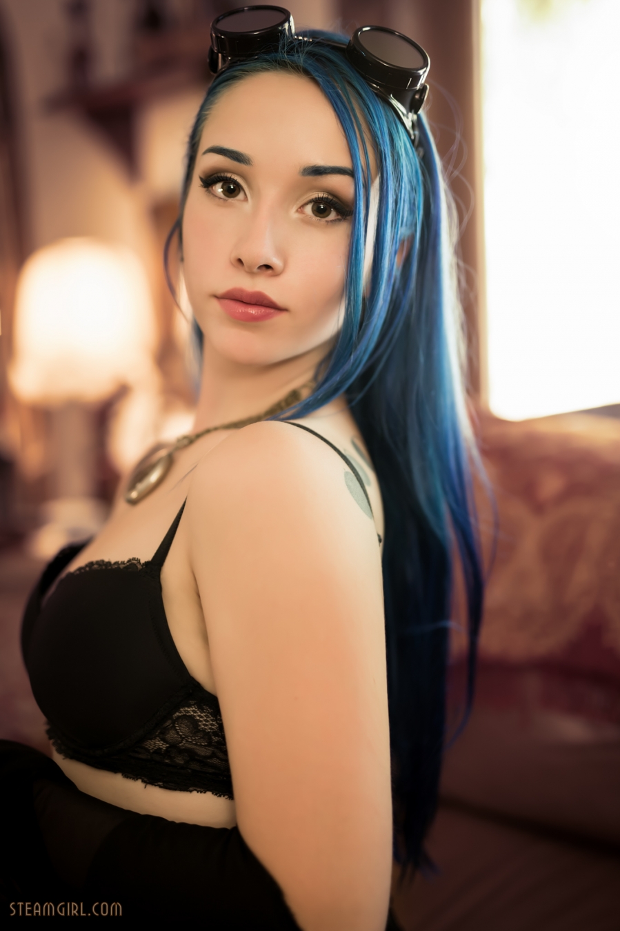 blue_hair breasts female goggles long_hair solo tattoo watermark