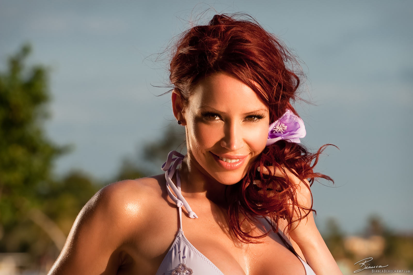 bianca_beauchamp bikini breasts cleavage female large_breasts long_hair red_hair smile solo water wet