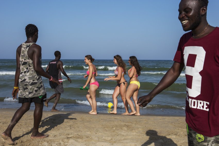 beach bikini breasts dark_skin female male multiple_girls refugee teeth water