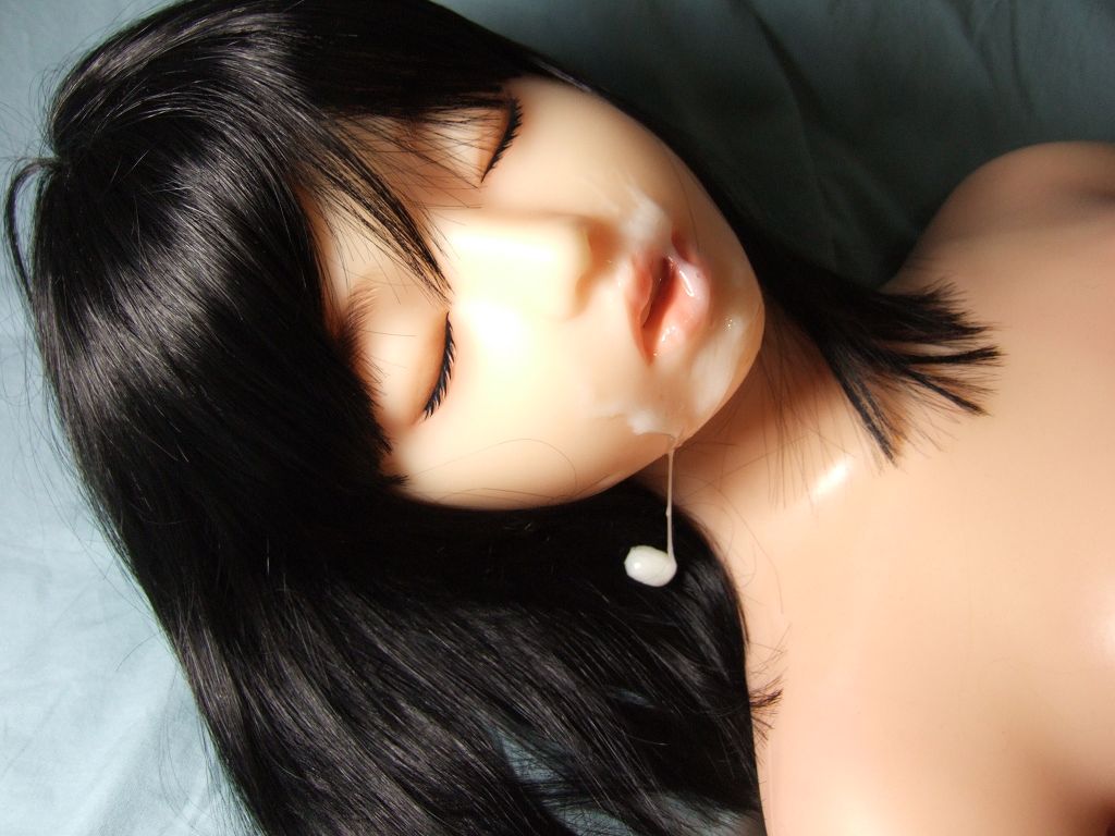 1girl black_hair cum eyes_closed facial long_hair lying sex_doll solo