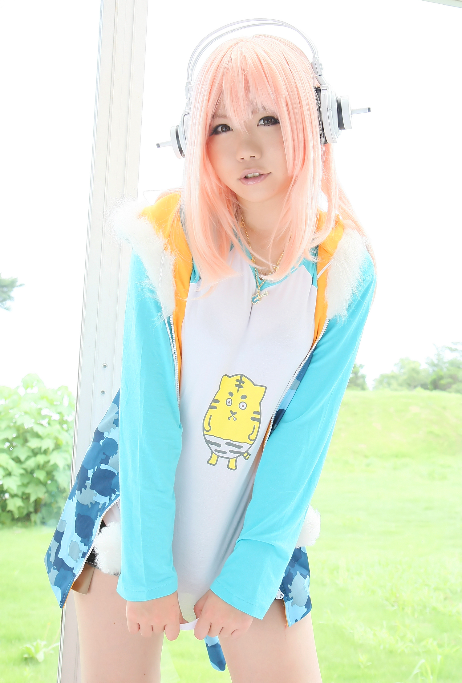 asian breasts cosplay female headphones large_breasts long_hair pink_hair solo super_sonico