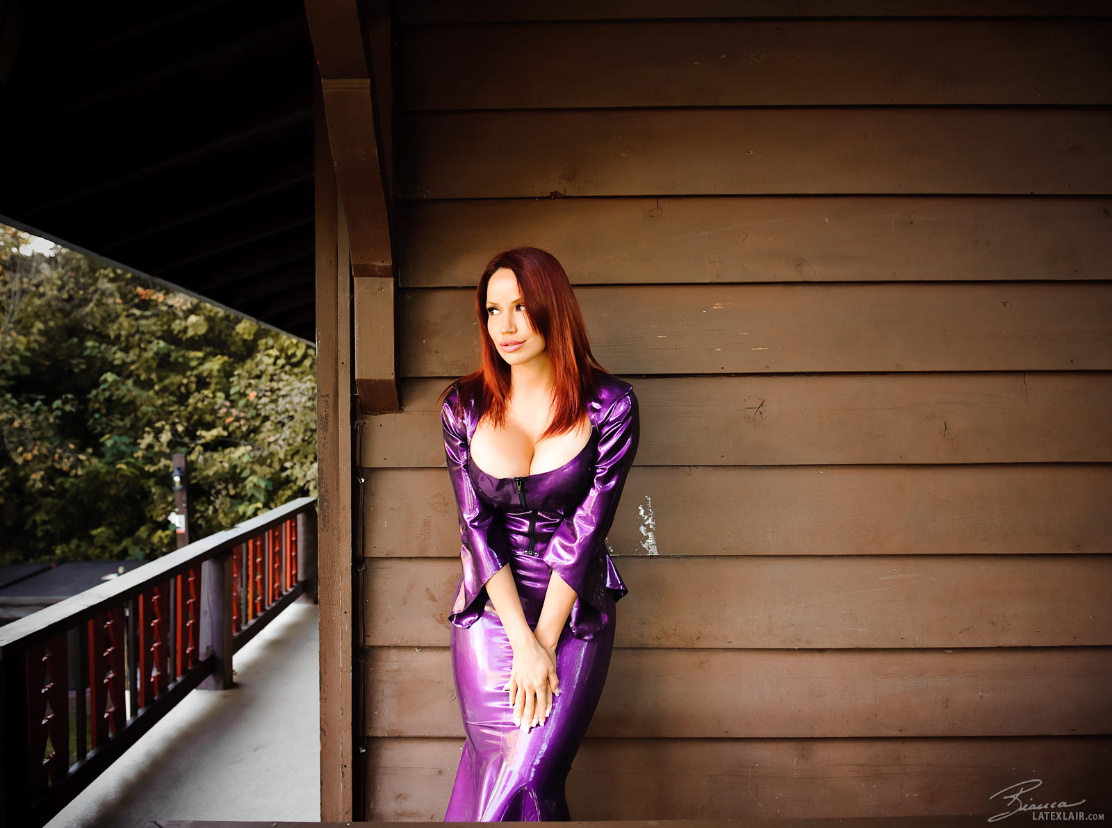 bianca_beauchamp breasts cleavage dress female large_breasts latex long_hair outside red_hair solo watermark