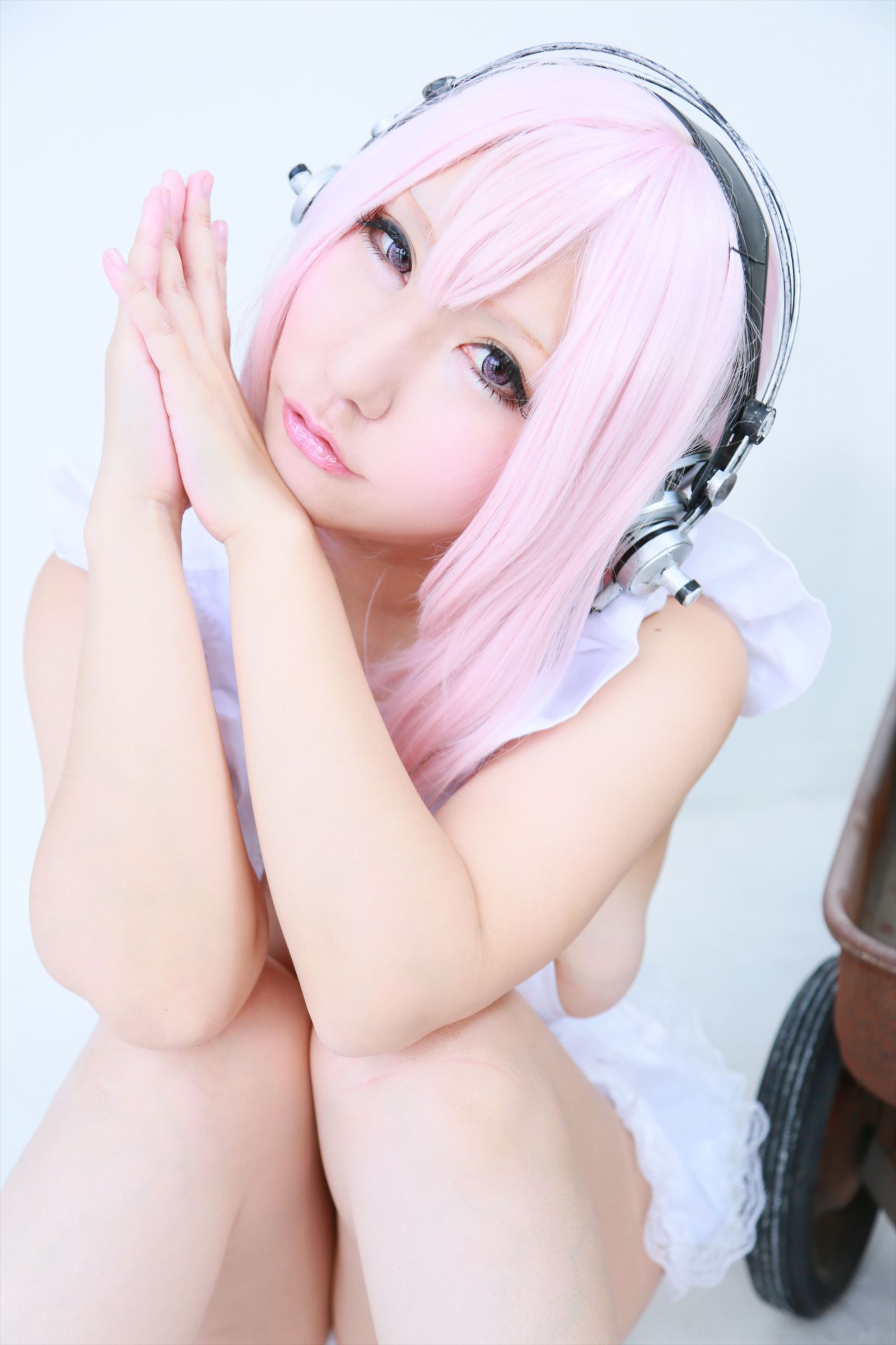 asian breasts female headphones large_breasts long_hair pink_hair shooting_star solo