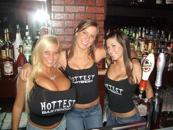 alcohol blonde_eyes breasts brown_hair cleavage clothes_writing female gigantic_breasts happy smile t-shirt watermark