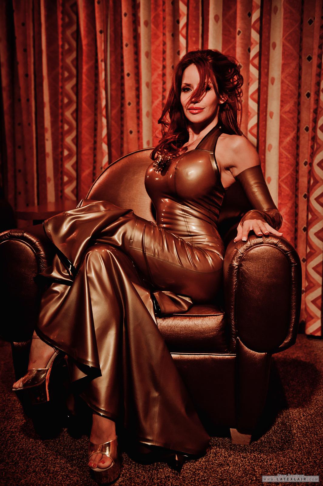 bianca_beauchamp breasts cleavage corset dress female high_heels large_breasts latex shoes solo watermark