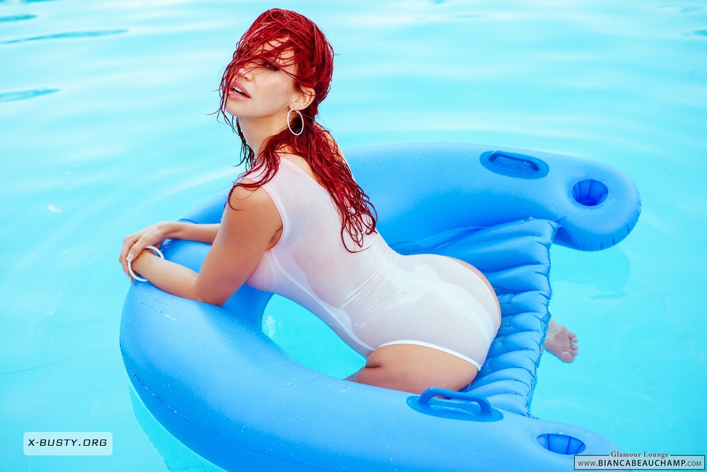 ass bianca_beauchamp breasts earrings female large_breasts leotard long_hair looking_back red_hair solo water watermark wet