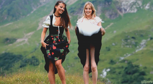 2girls animated clothed female funny gif happy mountain outdoors presenting pubic_hair pussy skirt_lift smile