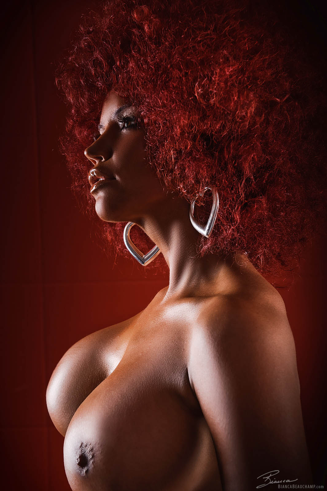 afro bianca_beauchamp breasts earrings female large_breasts long_hair red_hair solo watermark